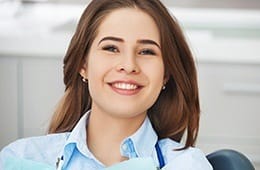 Smiling woman in dental chair