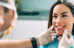 A dentist assessing his patient for cosmetic dentistry