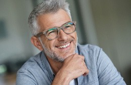 Close up of older man with glasses