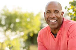 Smiling man enjoying the benefits of dental implants in Campbell