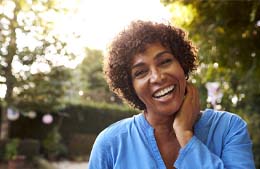 woman smiling in nature