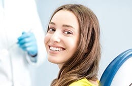 Woman smiling in dental chair