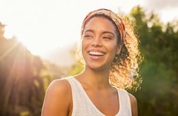 A young woman smiling