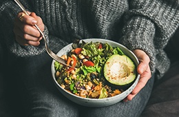 Closeup of woman eating a balanced lunch