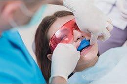 Child receiving fluoride treatment