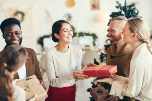 people with healthy smiles during the holidays