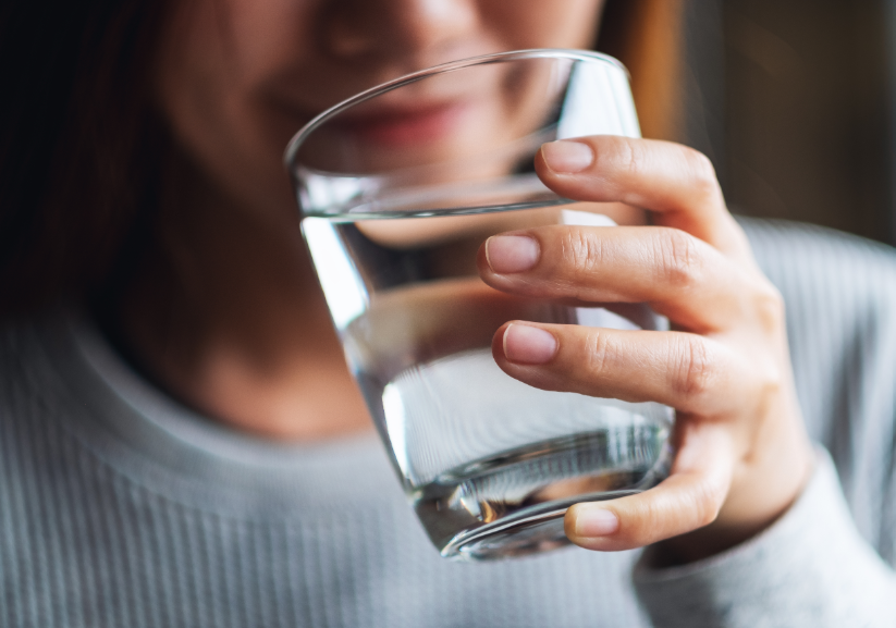 Woman drinking glass of water